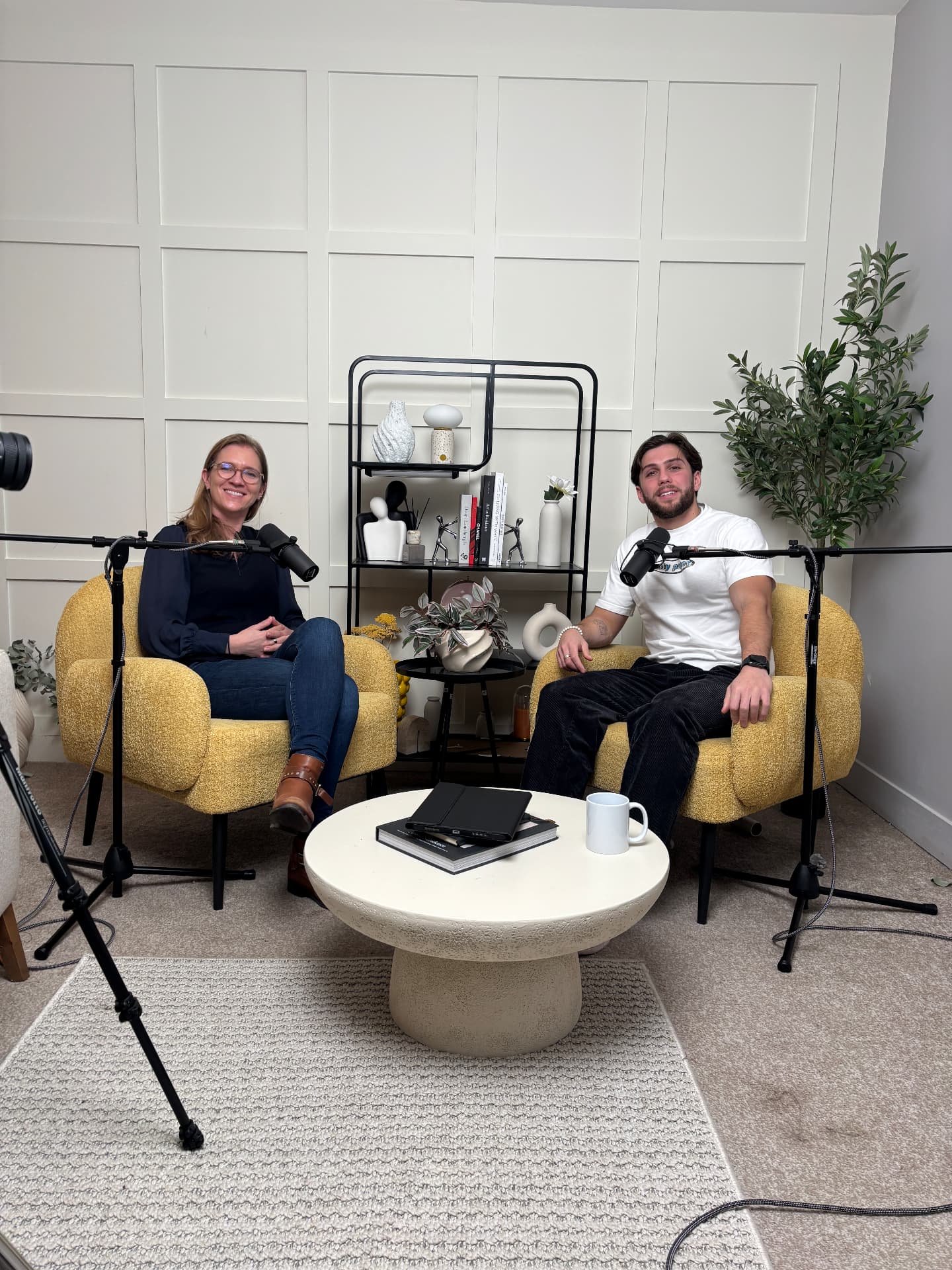 Luke Alfano in conversation with a guest in the podcast studio